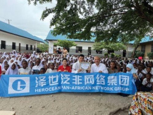 Herocean Pan-African Network Group donation with students at a school