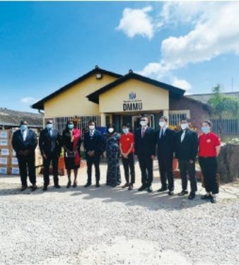 Dragon Group team at a community welfare handover